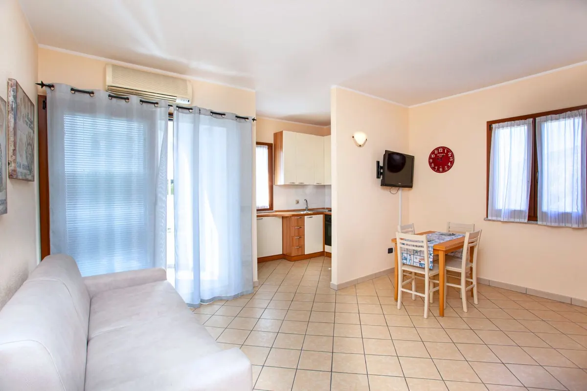 Mono Plus - Monolocale con veranda e piscina a La Caletta, foto 1