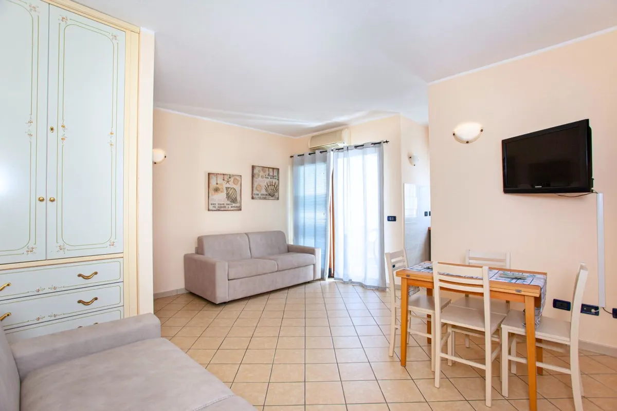 Mono Plus - Monolocale con veranda e piscina a La Caletta, foto 2
